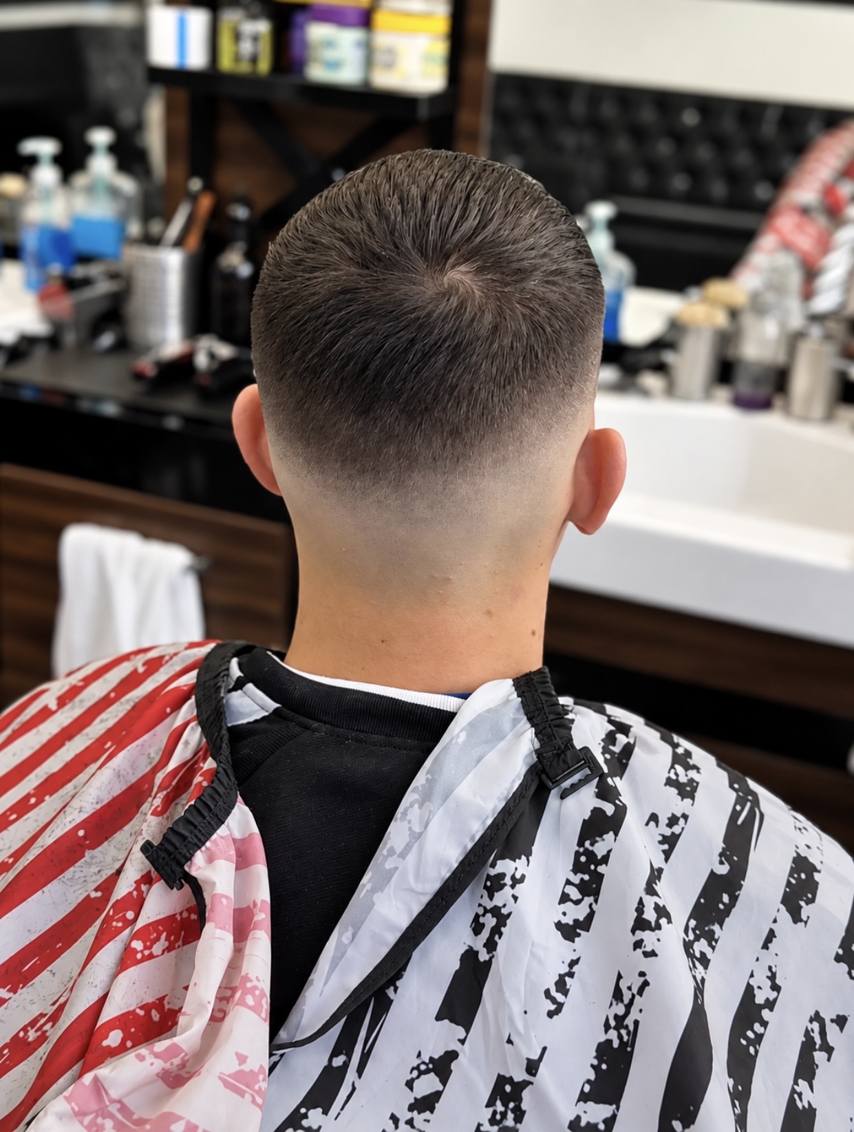 Cleanly finished neckline demonstrating close traditional barbering detail